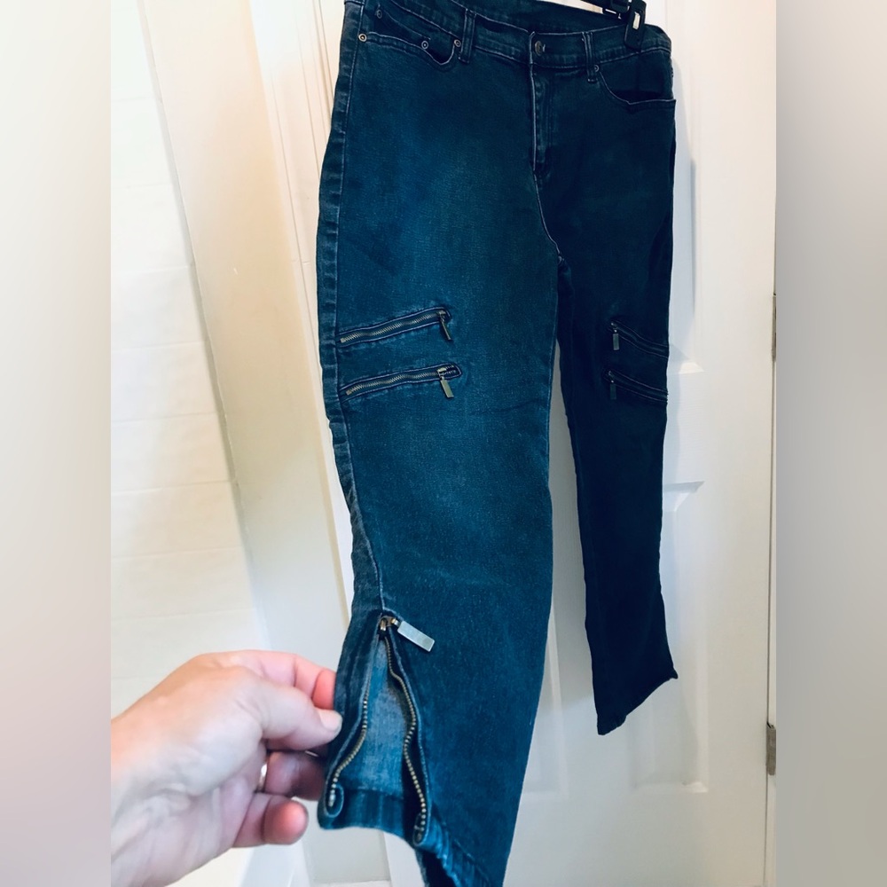 14P - DG by Diane Gilman.  Dark wash jeans embellished with 6 brass zippers.